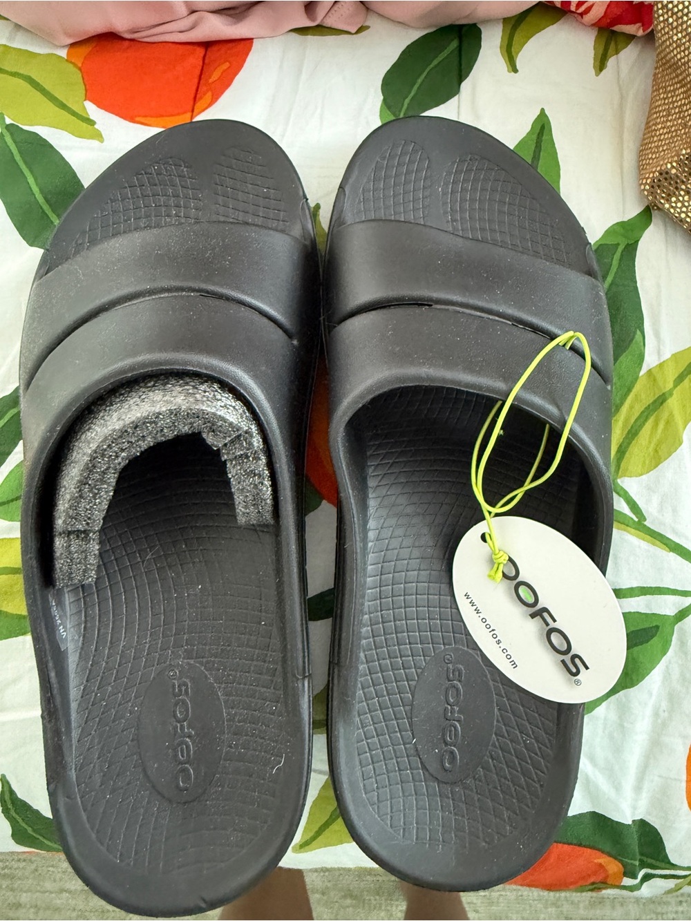 OOFOS Black Slide Sandals with Neon Yellow Tag